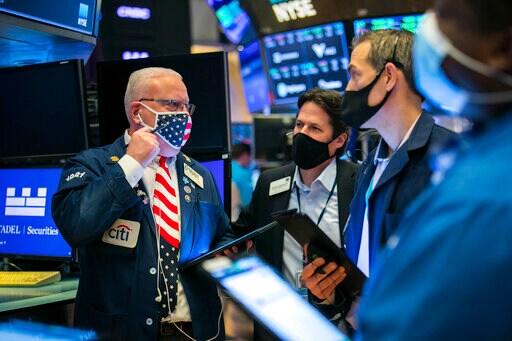 Stocks Ease Mostly Lower On Wall Street, Except For Tech