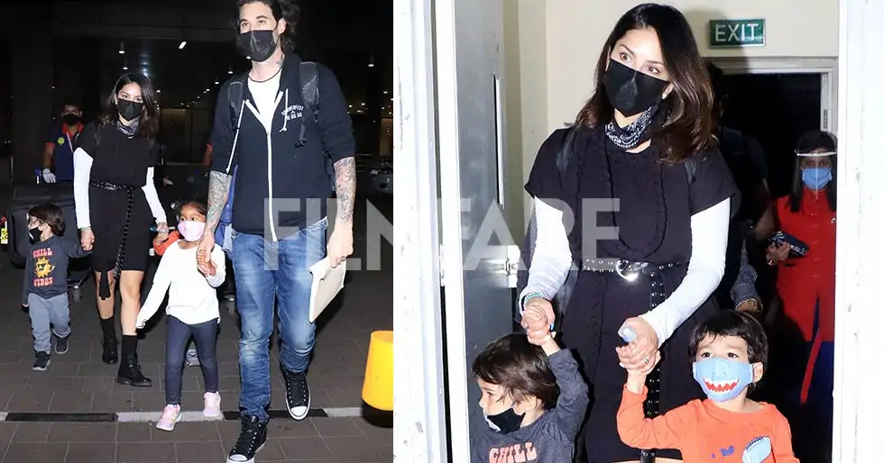 Back in town! Sunny Leone returns to India with her family