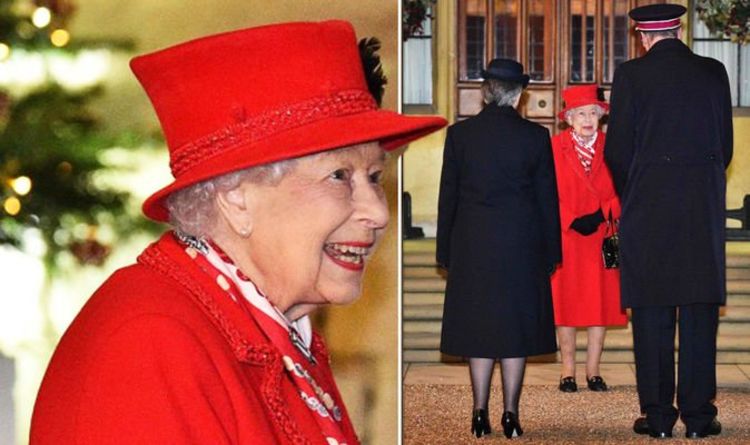 Queen wears bright red in moving tribute for frontline workers in rare royal outing