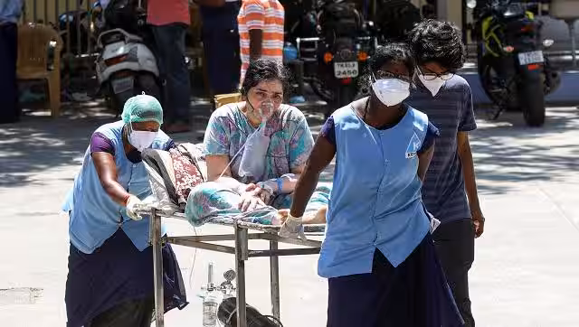 India reports 1.86 lakh new COVID-19 cases, lowest daily spike in 44 days; positivity rate down at 9%-India Ne