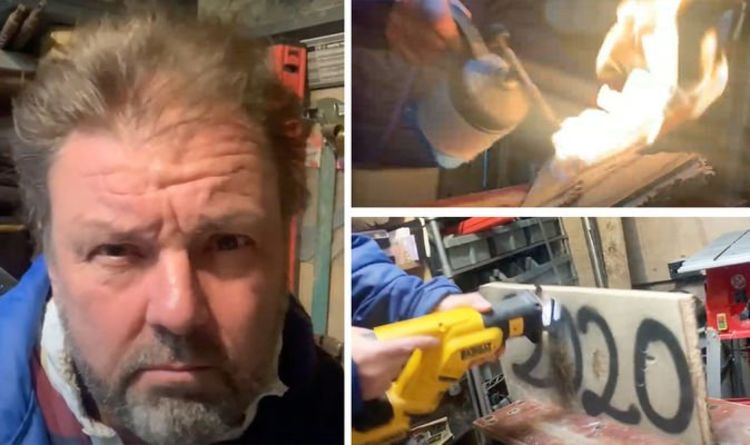 Martin Roberts: Homes Under The Hammer host attacks 2020 sign with hammer and blowtorch