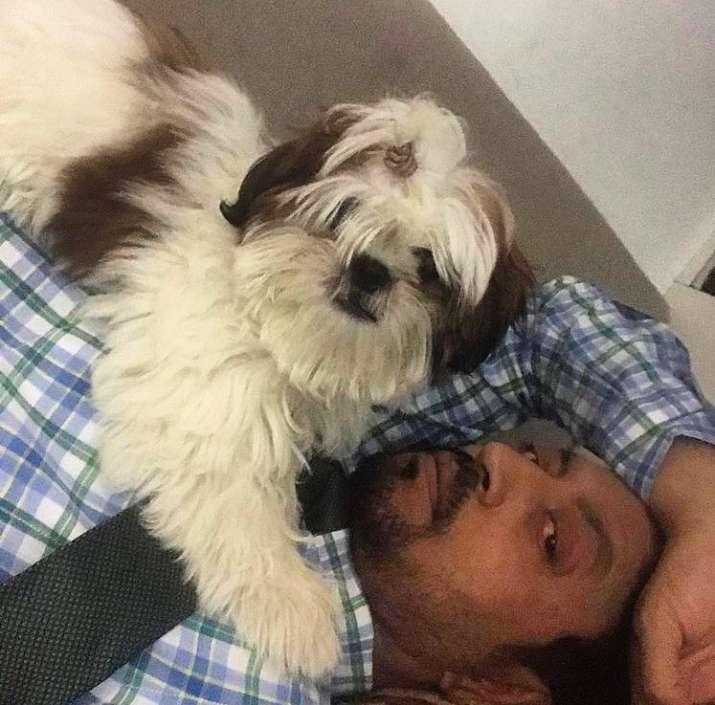Babil shares BTS pic of Irrfan Khan chilling with cute pup on 'Blackmail' set