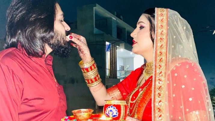 Sapna Choudhary shares FIRST PICS with husband Veer Sahu on Karwa Chauth, stuns in red outfit