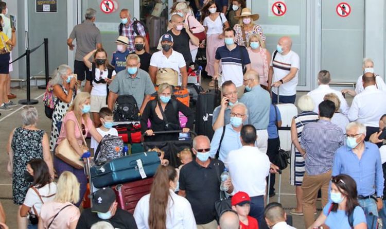 Furious Spanish rage 'get out' at English tourists in chaos at Malaga airport