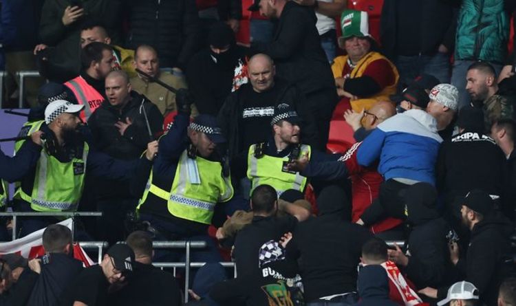 Hungary fans clash with police inside Wembley during England match as batons used