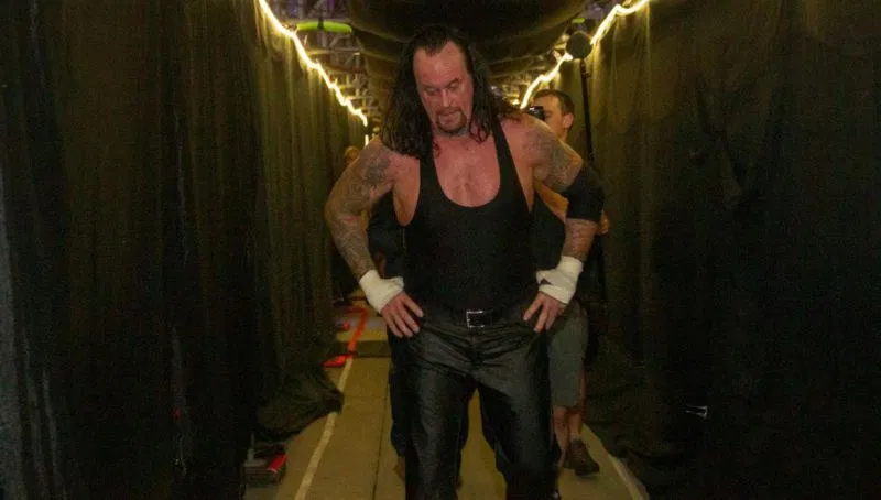 Booker T explains why The Undertaker will have one more match in WWE