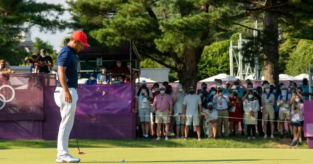 Xander Schauffele wins the gold medal in golf.