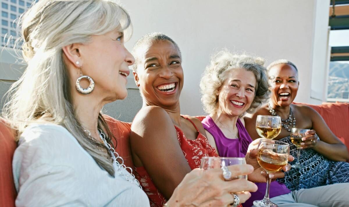 Cheers! Daily dose of alcohol could HELP ward off THREE major killers - new study says