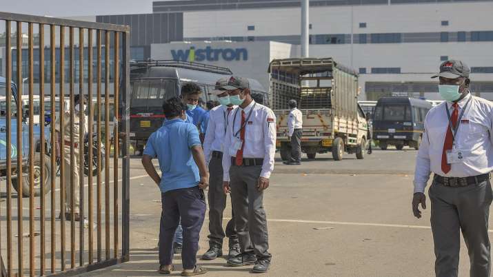 Apple suspends new business with iPhone contract manufacturer Wistron after violence at plant