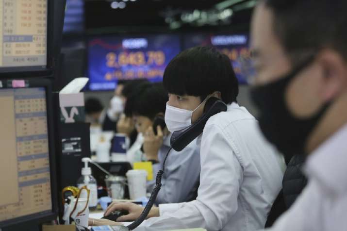 Asian shares mixed despite fresh records on Wall Street
