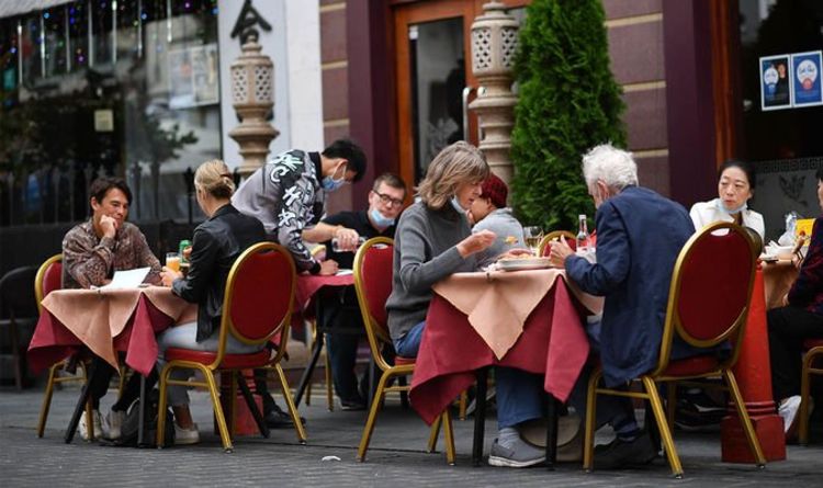 Can I meet friends in a restaurant in Tier 2?